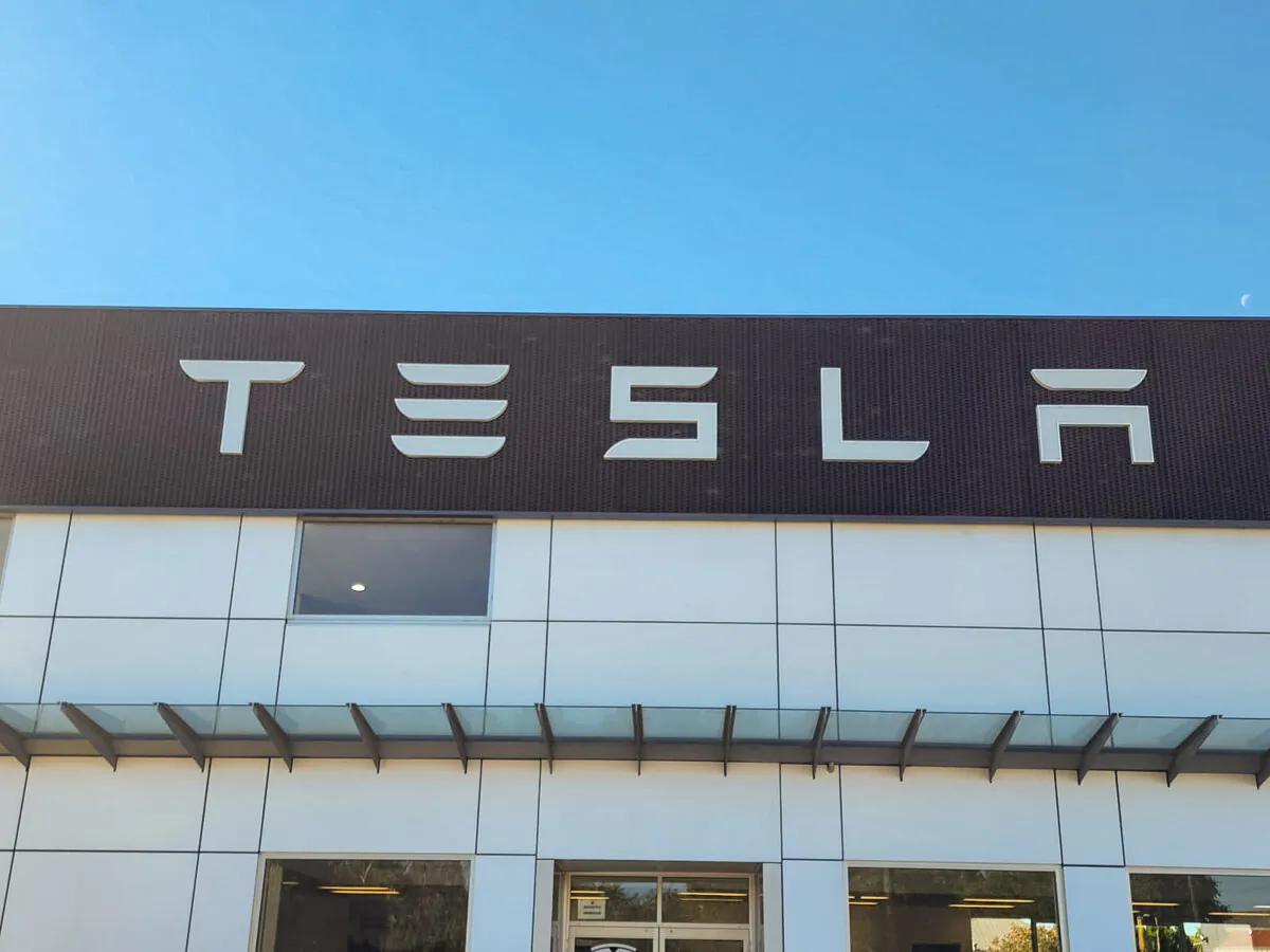 A Tesla logo is seen at a dealership in Perth, Western Australia, on March 16, 2024. (Susan Mortimer/The Epoch Times)
