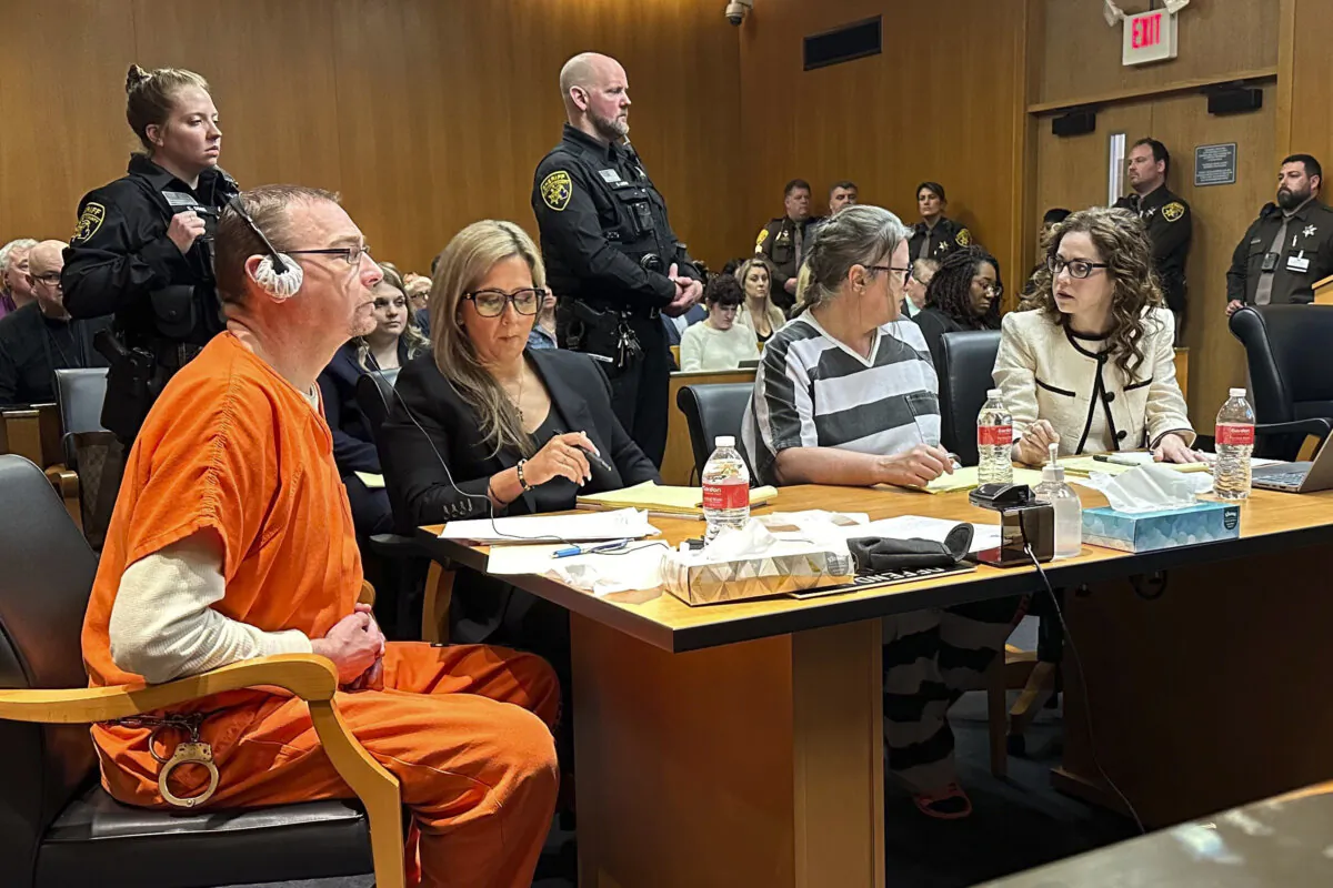 (L–R) James Crumbley, defense lawyer Mariell Lehman, Jennifer Crumbley, and defense lawyer Shannon Smith await sentencing in Oakland County, Mich., court on April 9, 2024. (Ed White/AP Photo)