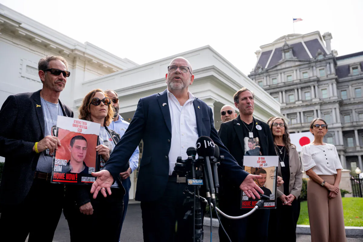 Jonathan Dekel-Chen (C), father of Sagui Dekel-Chen, one of the hostages taken by Hamas from Kibbutz Nir Oz on Oct. 7, 2023, speaks to members of the media in front of the West Wing of the White House in Washington on April 9, 2024. (Andrew Harnik/Getty Images)