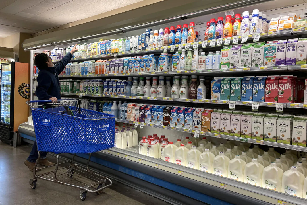A man shops for milk in California in a file photograph. (Justin Sullivan/Getty Images)