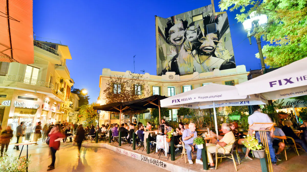 In the “rickety-chic” Psyrri neighborhood of Athens, you’ll find slick outdoor restaurants next to vibrant street art. (Cameron Hewitt/TNS)
