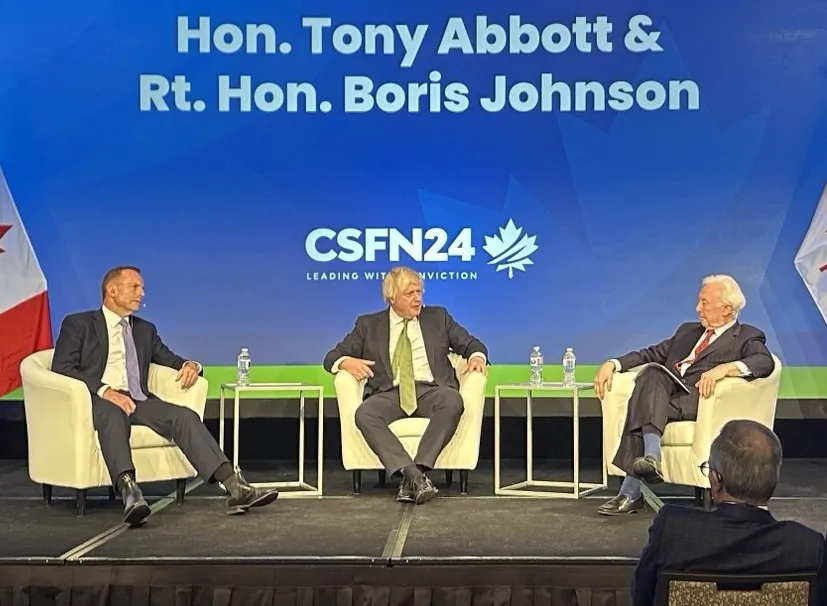 (L-R) Former Australian Prime Minister Tony Abbott, former British Prime Minister Boris Johnson, and host John O’Sullivan, president of the Danube Institute in Budapest, speak at a panel on the opening day of the Canada Strong and Free Network conference in Ottawa on April 10, 2024. (Omid Ghoreishi/The Epoch Times)