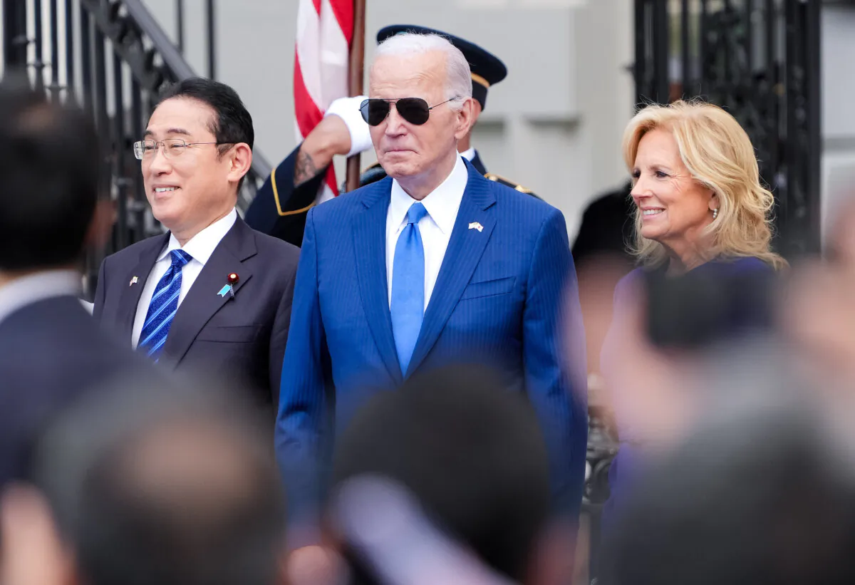 President Joe Biden, center, stands with First Lady Jill Biden and Japanese Prime Minister Fumio Kishida at the White House in Washington on April 10, 2024. (Andrew Harnik/Getty Images)