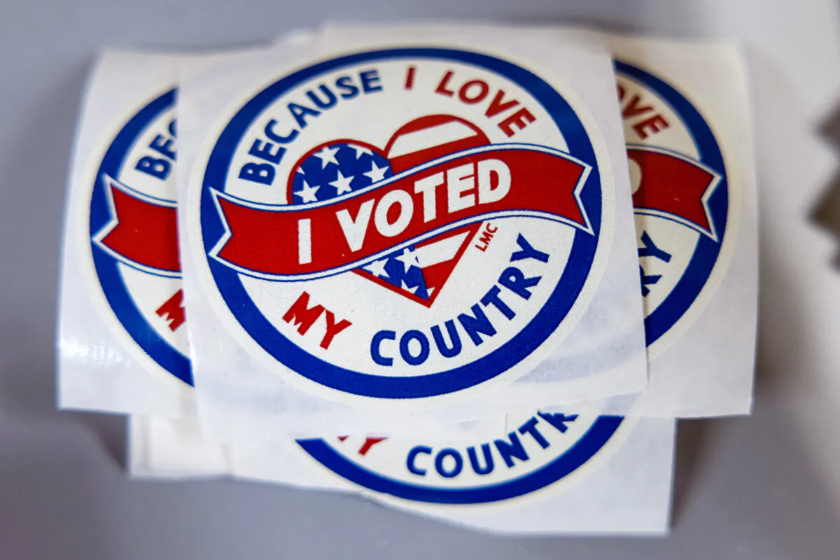 Stickers are passed out to residents who vote in the state's primary election in Green Bay, Wis., on April 2, 2024. (Scott Olson/Getty Images)