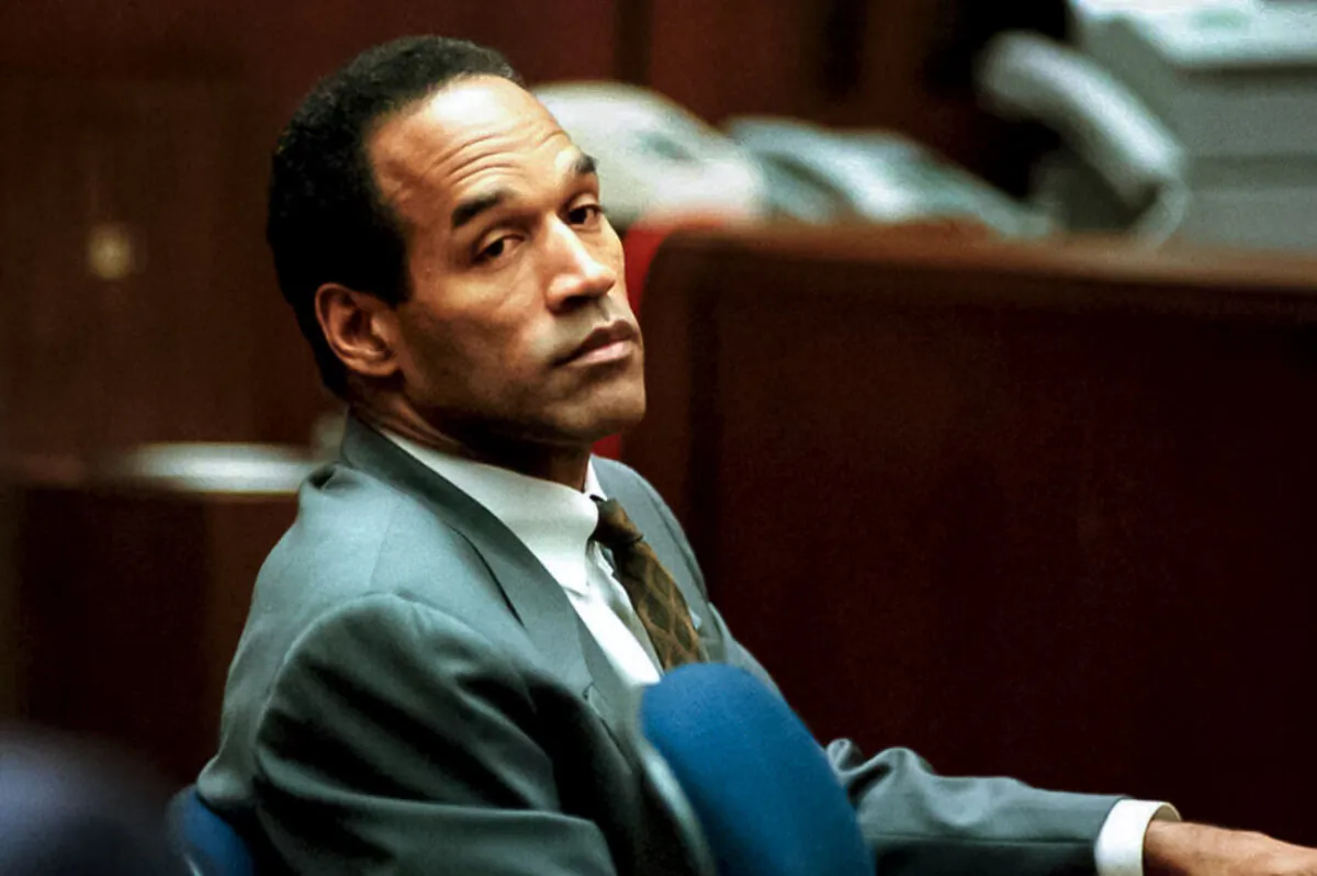 O.J. Simpson sits in court in a December 1994 file photo. (POOL/AFP via Getty Images)