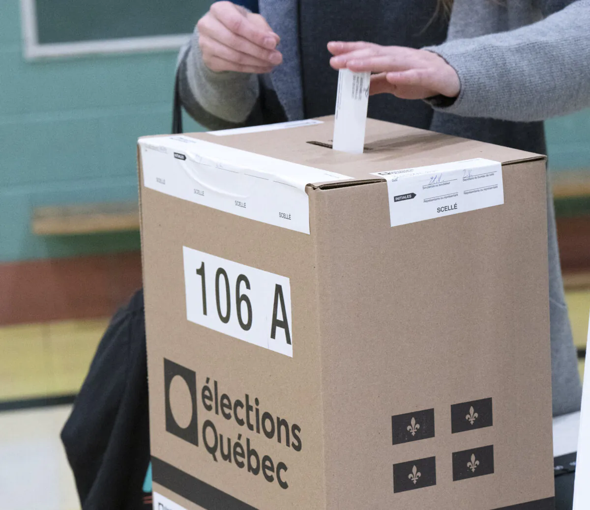 A voter casts her ballot in the Quebec provincial election in Montreal on Oct. 3, 2022. (The Canadian Press/Ryan Remiorz)