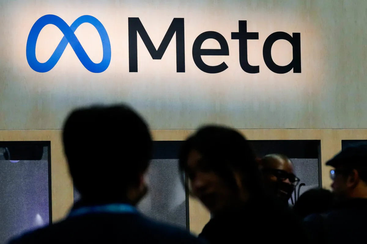 Attendees visit the Meta booth at the Game Developers Conference 2023 in San Francisco on March 22, 2023. (Jeff Chiu/AP Photo)