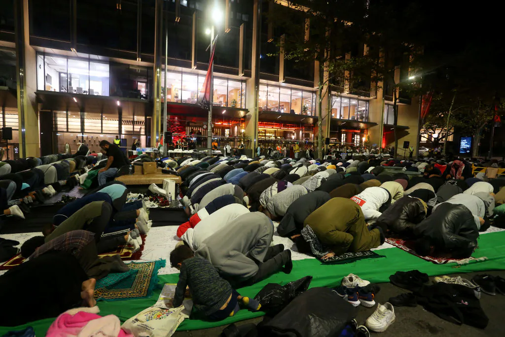 Members of the Sydney Muslim community hold Taraweeh Prayer for Palestine at Martin Place in Sydney, Australia on March 22, 2024. (Lisa Maree Williams/Getty Images)