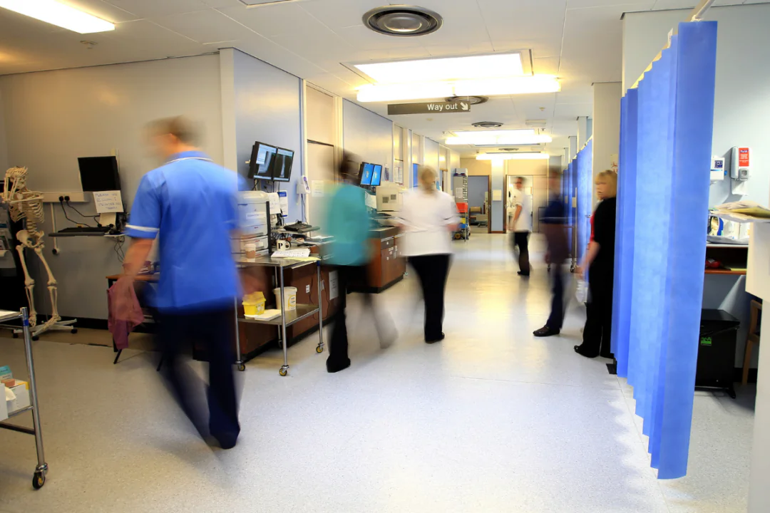 File photo of staff on a NHS hospital ward on Oct 3, 2014. (Peter Byrne/PA Wire)
