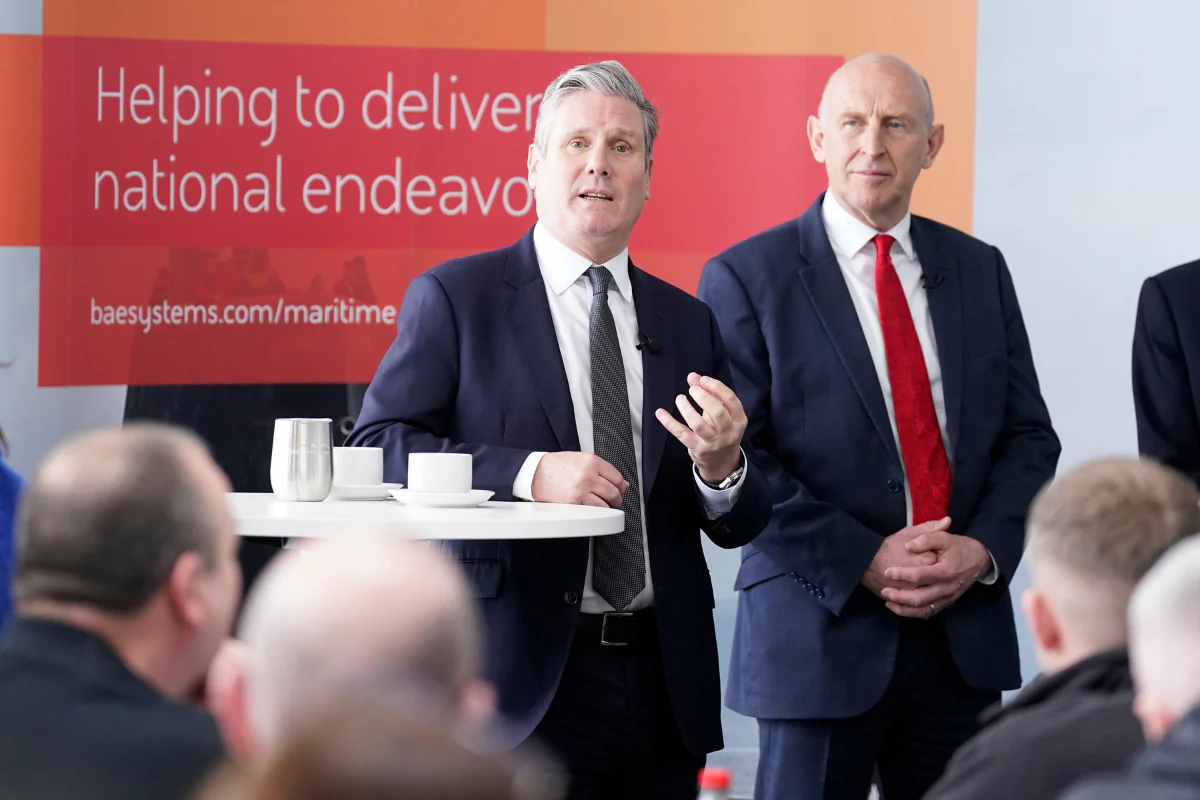 Labour Party leader Sir Keir Starmer speaking as shadow defence secretary John Healey (R) listens during a campaign visit to BAE Systems in Barrow-in-Furness, Cumbria, on April 12, 2024. (Danny Lawson/PA Wire)