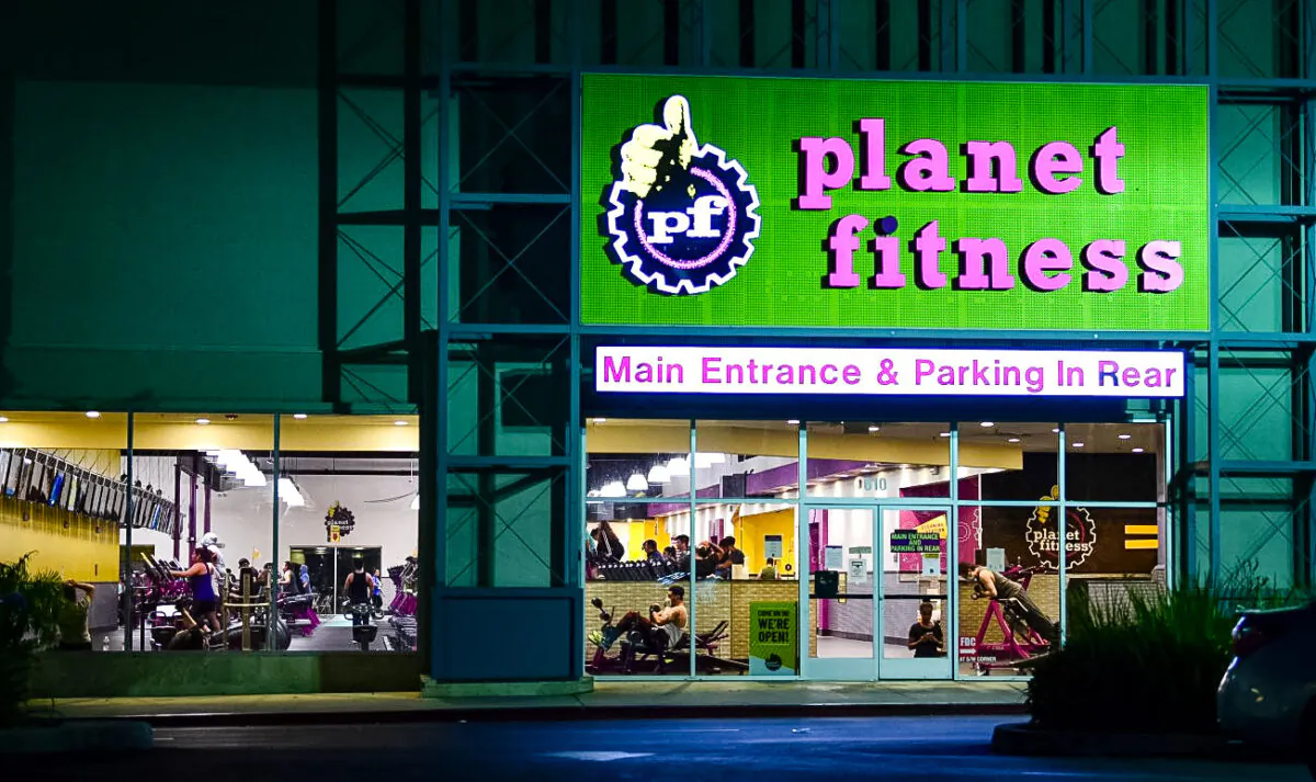 People work out at a Planet Fitness gym in Alhambra, Calif., in a file photo. (Frederic J. Brown/AFP via Getty Images)