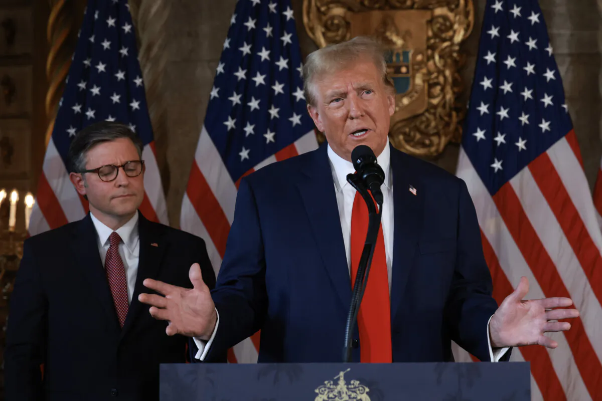 Republican presidential candidate former President Donald Trump and Speaker of the House Mike Johnson (R-La.) hold a press conference at Mr. Trump's Mar-a-Lago estate on in Palm Beach, Florida, on April 12, 2024. (oe Raedle/Getty Images)