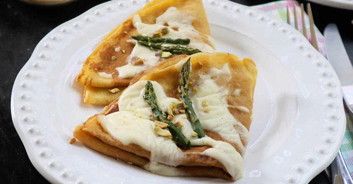 Pureed asparagus blended with fresh ricotta is a seasonal filling for these savory crepes. (Gretchen McKay/Pittsburgh Post-Gazette/TNS)