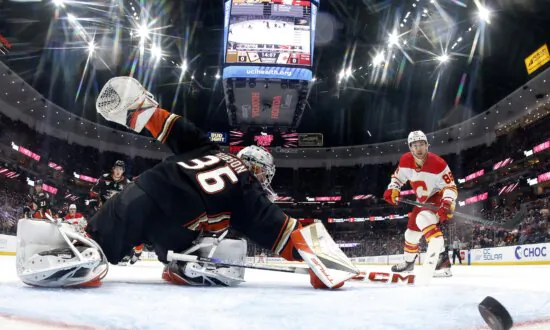 Andrei Kuzmenko’s Hat Trick Lifts Flames Over Ducks
