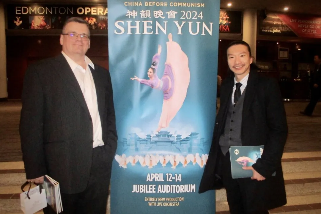 Shadren Carlson (L) and Benny Chong enjoyed Shen Yun's evening performance at the Northern Alberta Jubilee Auditorium in Edmonton, Alta., on April 12, 2024. (Caifeng Lin/The Epoch Times)