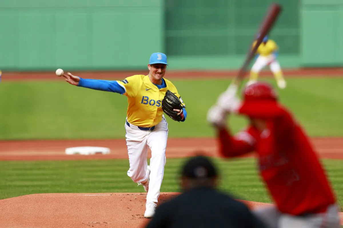 Starting pitcher Cooper Criswell (64) of the Boston Red Sox pitches at the top first inning of the game against the Los Angeles Angels in Boston on April 13, 2024. (Omar Rawlings/Getty Images)