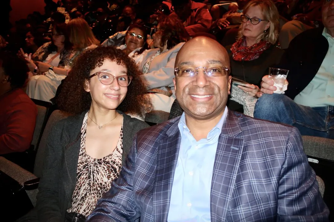 Richard Gamble and his daughter Lily attended Shen Yun Performing Arts at the Harris Theater in Chicago on April 13, 2024. (Stacey Tang/The Epoch Times)