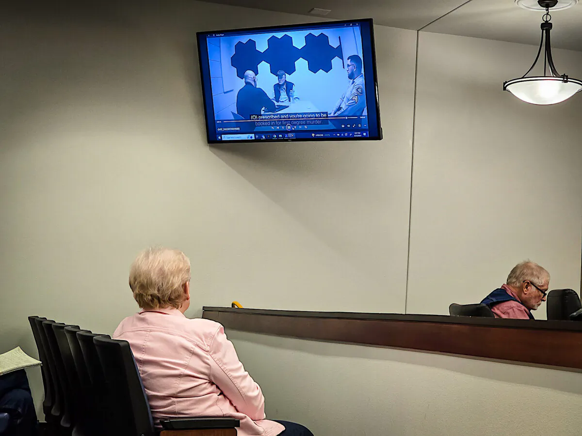Wanda Kelly (L), wife of George Alan Kelly (R), accused of second-degree murder, watches a police interview video with her husband the night he was arrested on Jan. 30, 2023. Photo taken in Nogales, Ariz., on April 12, 2024. (Allan Stein/The Epoch Times)
