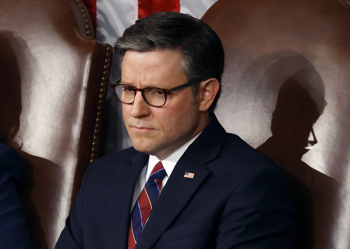 House Speaker Mike Johnson (R-La.) listens to Japanese Prime Minister Fumio Kishida as he addresses a joint meeting of Congress in the House of Representatives at the U.S. Capitol on April 11, 2024. (Chip Somodevilla/Getty Images)