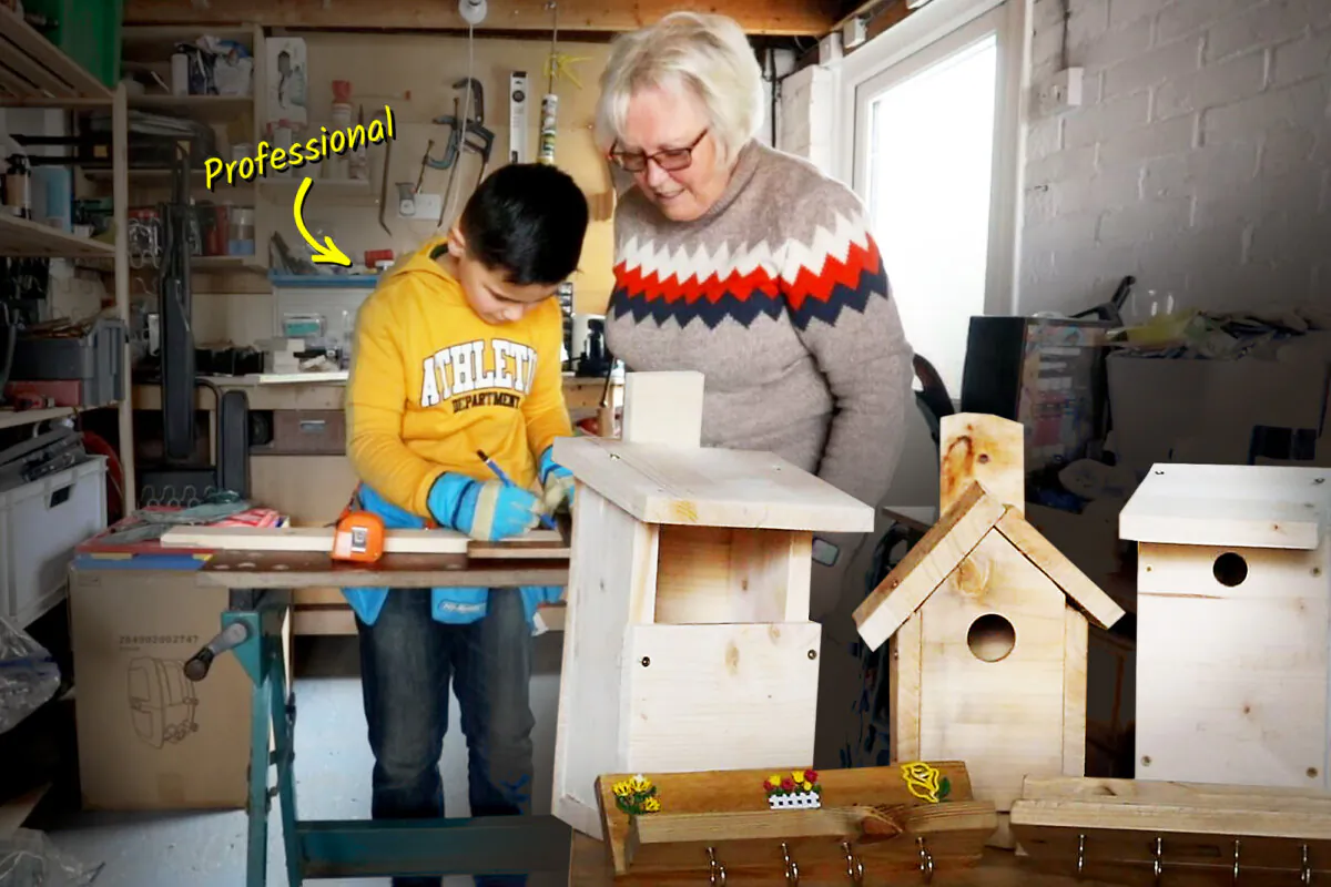 Ollie Ridley and his grandma working in the woodshop. (SWNS)