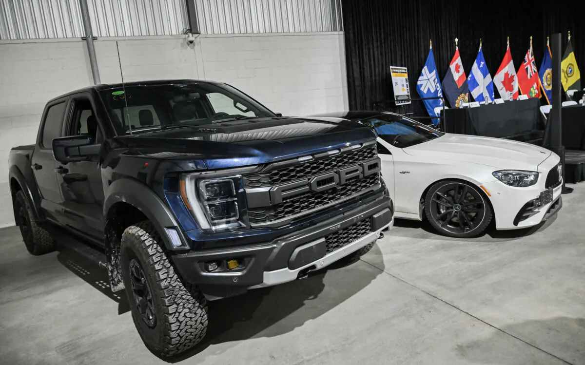 Two recovered stolen vehicles are shown ahead of a news conference in Montreal, on April 3, 2024. (The Canadian Press/Graham Hughes)