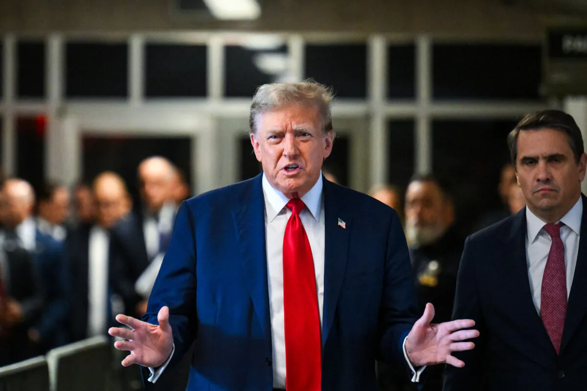 Former President Donald Trump speaks to the press as he arrives for the first day of his trial for allegedly covering up hush money payments at Manhattan Criminal Court in New York City on April 15, 2024. (Angela Weiss/Getty Images)