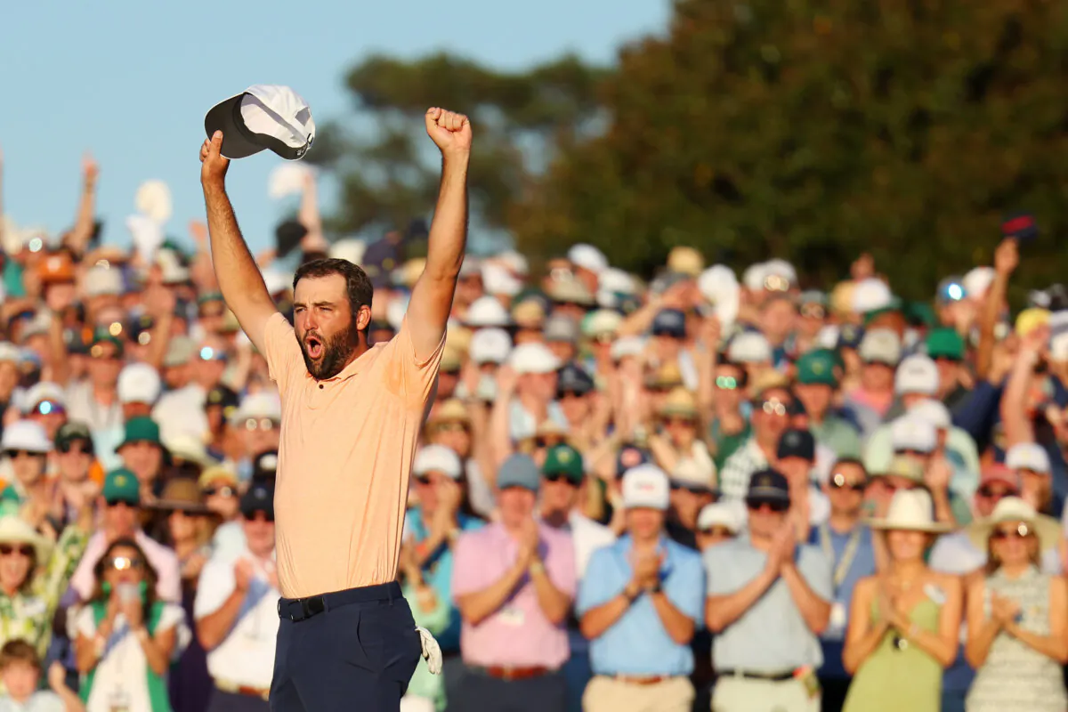 Scottie Scheffler of the United States celebrates on the 18th green after winning the 2024 Masters Tournament at Augusta National Golf Club in Augusta, Ga. on April 14, 2024. (Andrew Redington/Getty Images)