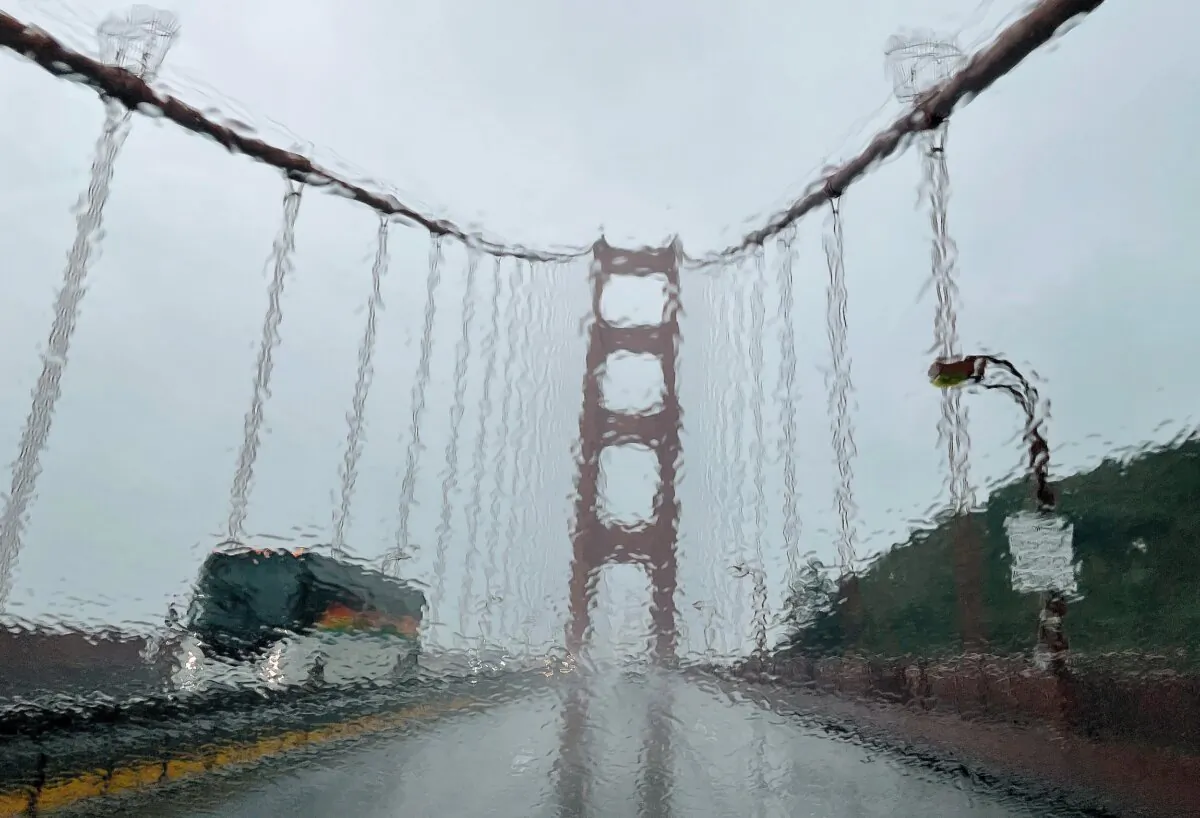 The Golden Gate Bridge is seen through a rain-covered windshield in San Francisco on Jan. 4, 2023. (Justin Sullivan/Getty Images)