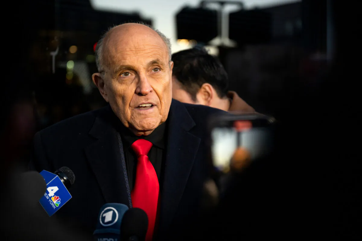 Rudy Giuliani speaks to members of the media in Manchester, N.H., on Jan. 21, 2024. (Brandon Bell/Getty Images)