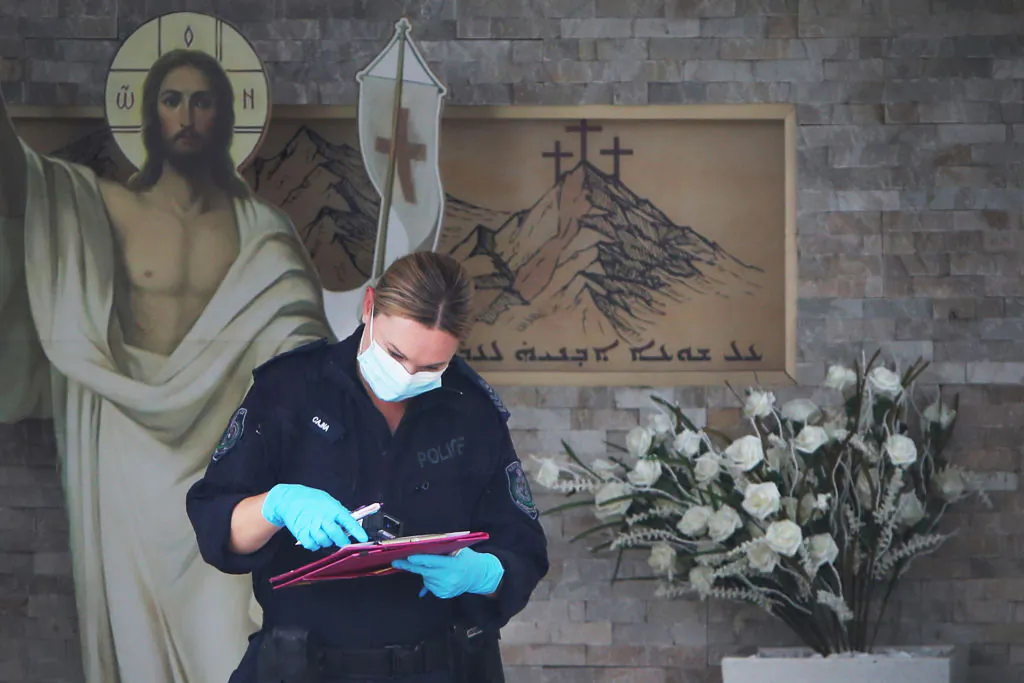 A member of NSW Forensic police is seen at Christ The Good Shepherd Church in the suburb of Wakeley in western Sydney, Australia on April 16, 2024. (Lisa Maree Williams/Getty Images)