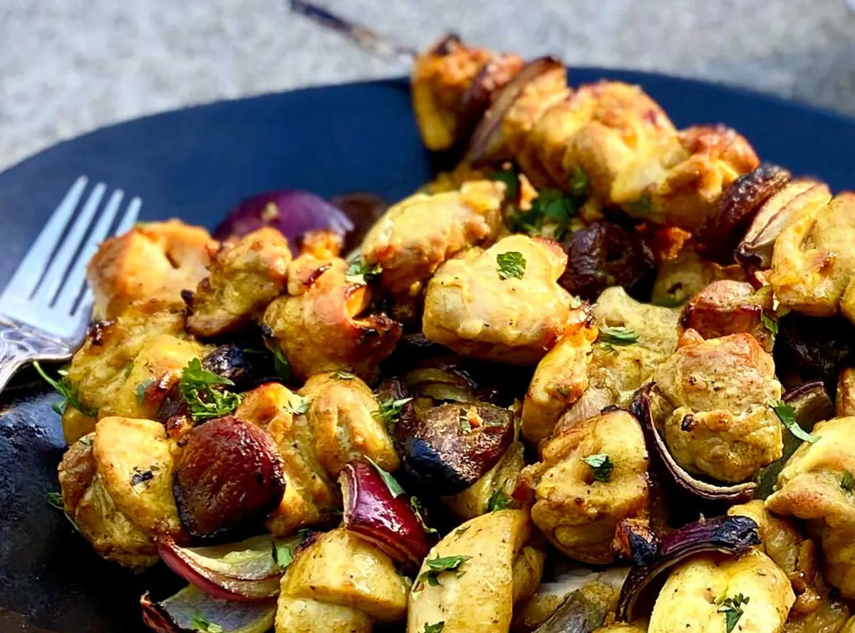 Skewered chicken is extra flavorful and juicy, with lots of crispy bits and toasty, charred flavor. (Lynda Balslev for Tastefood)