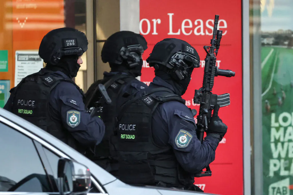 Police enter the Westfield Bondi Junction shopping mall after a stabbing incident in Sydney on April 13, 2024. (David Gray/AFP via Getty Images)