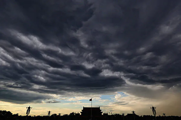 A general view of Tiananmen Square under rain clouds in Beijing on July 4, 2013. (Feng Li/Getty Images)