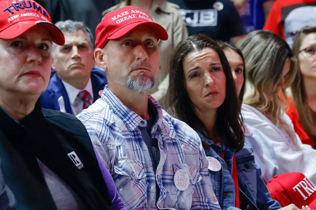Laken Riley's parents Jason Riley (C) and Allyson Phillips attend Republican presidential candidate and former President Donald Trump's campaign rally at the Forum River Center in Rome, Ga., on March 9, 2024. (Chip Somodevilla/Getty Images)