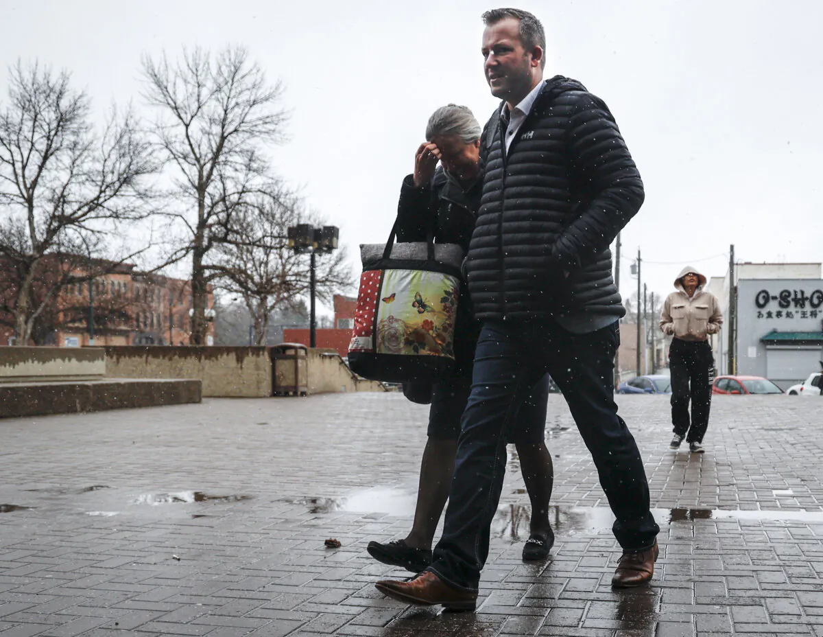 Marco Van Huigenbos, right, arrives at the courthouse in Lethbridge, April 16, 2024. Van Huigenbos is one of three men accused of orchestrating the border shutdown at Coutts in 2022. (THE CANADIAN PRESS/Jeff McIntosh)