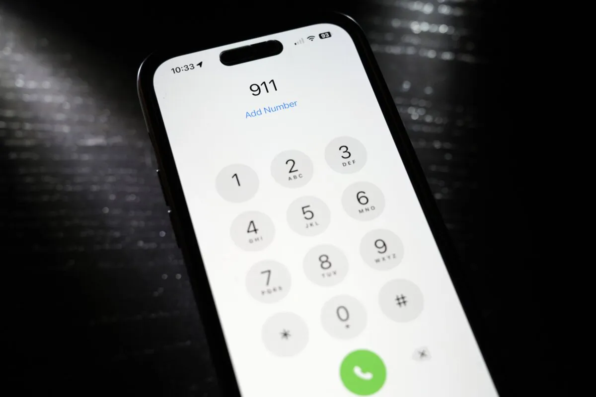 The number 911 is dialed on a mobile phone in St. Louis on April 18, 2024. (Jeff Roberson/AP Photo)