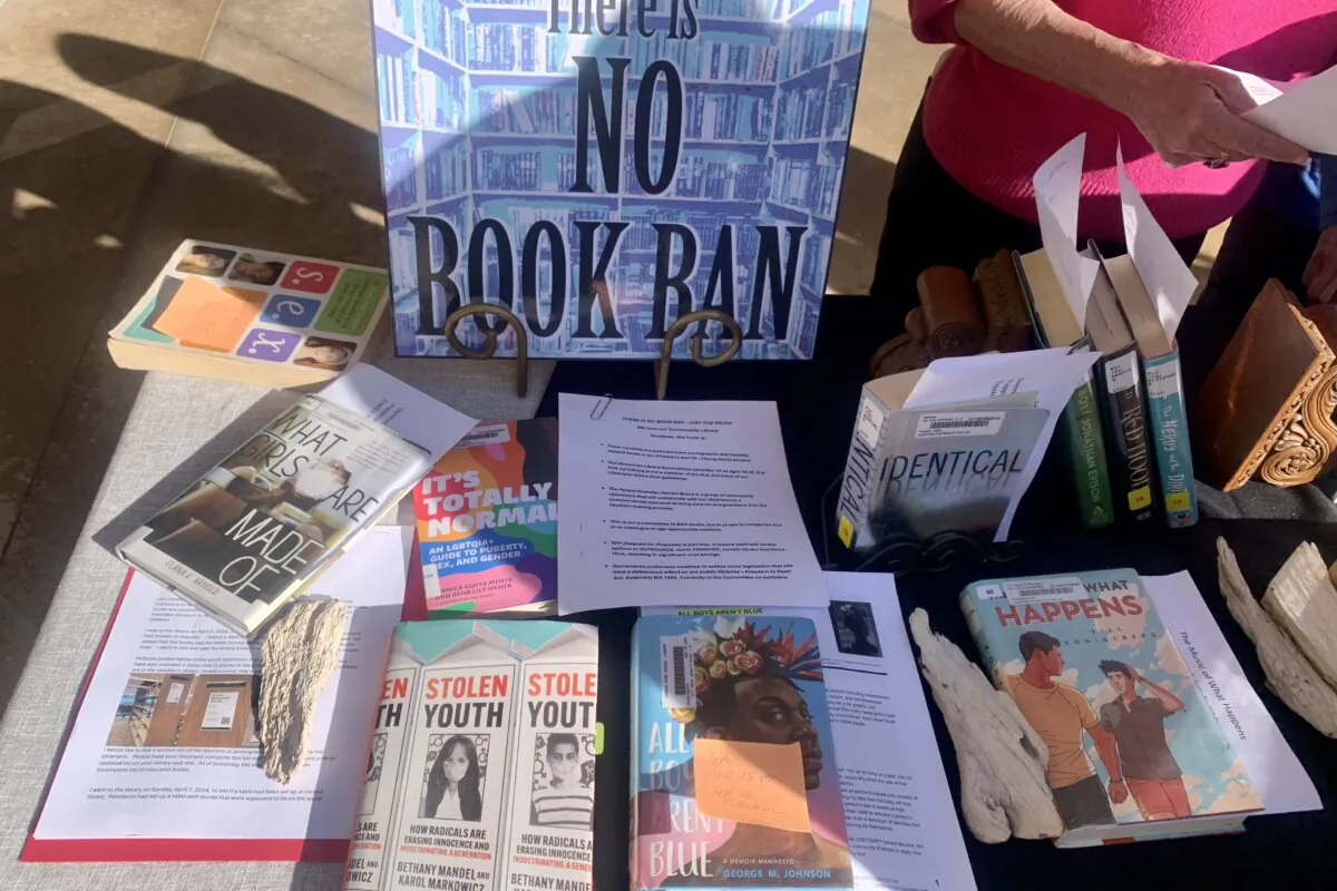A group of Huntington Beach residents organized a pop-up event to raise awareness of what they say are “inappropriate” books in the children’s section of the city's library, at City Hall in Huntington Beach, Calif., on April 16, 2024. (Courtesy of Patricia Pappas)
