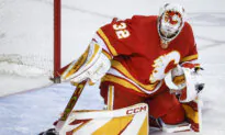Wolf, Flames Beat Sharks in NHL-First Game Matching California-Born Goalies