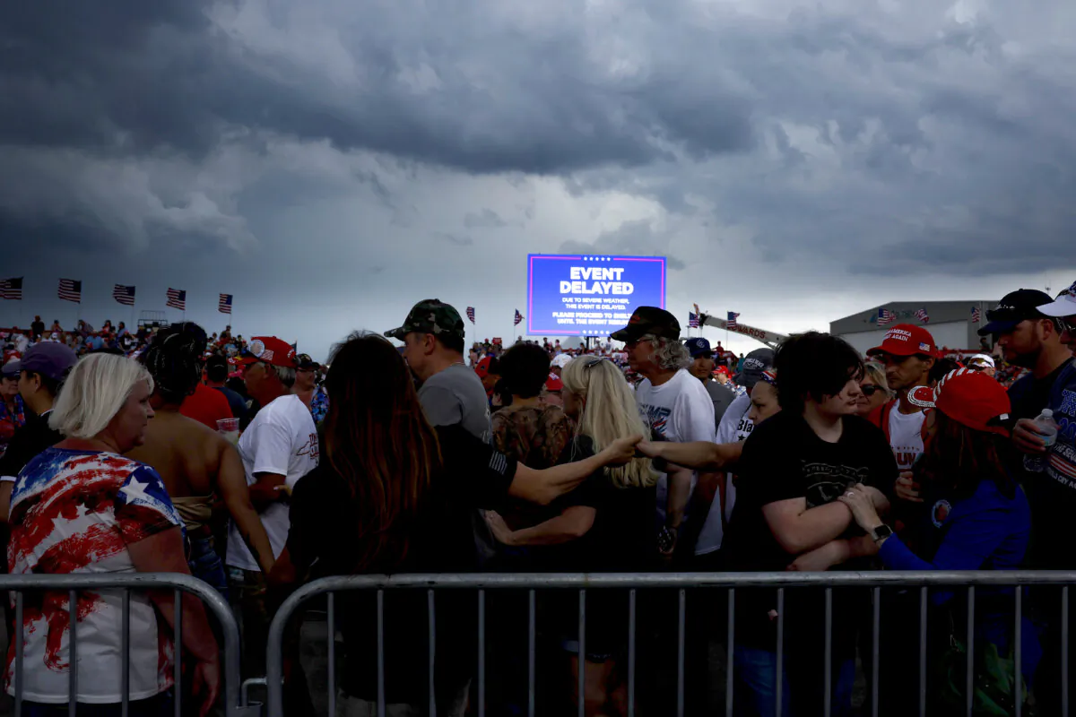 Attendees leave after a rally for former President Donald Trump was postponed at the Aero Center Wilmington in Wilmington, N.C., on April 20, 2024. (Anna Moneymaker/Getty Images)