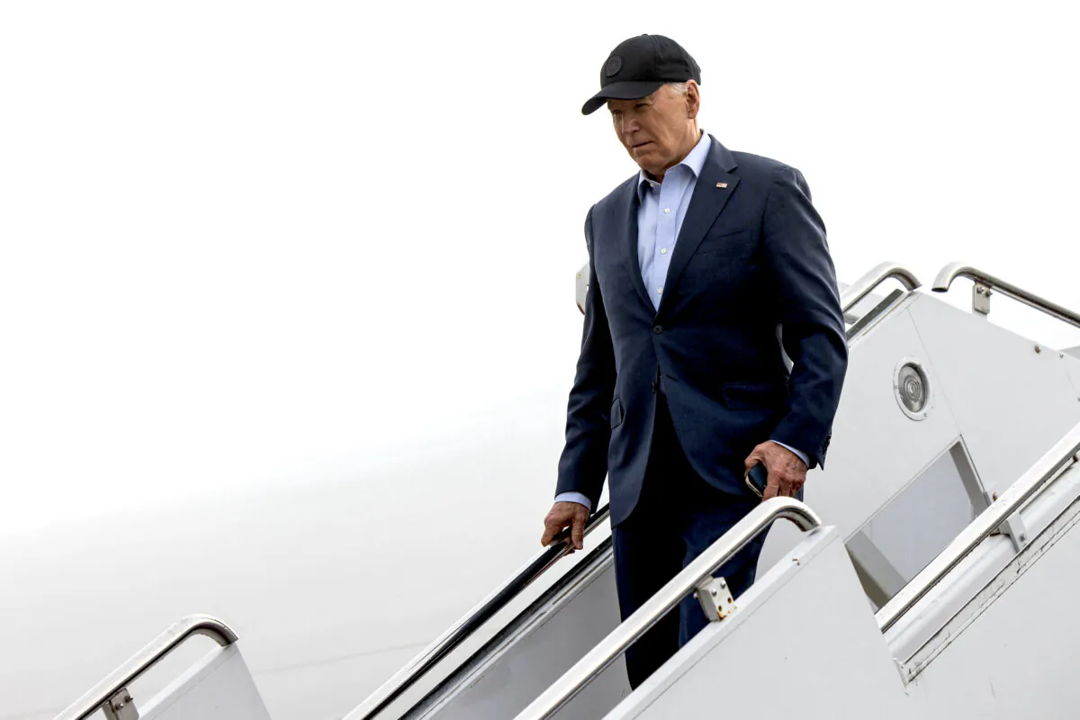 President Joe Biden steps off of Air Force One upon arrival at Delaware Air National Guard in New Castle, Del., on April 19, 2024. (Julia Nikhinson/AFP via Getty Images)