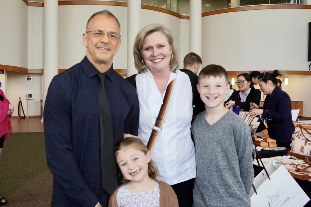 Joel and Jennifer Kelley with their children at Shen Yun Performing Arts at the OCCC Visual and Performing Arts Center Theate, in Oklahoma City, on April 20, 2024. (Sonia Wu/The Epoch Times)