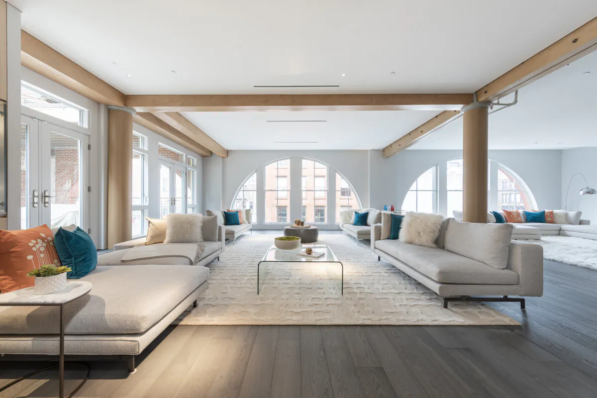 An expansive living room is defined using multiple seating areas. (Handout/TNS)
