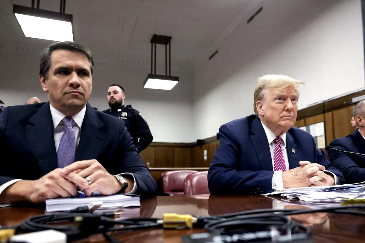 Attorney Todd Blanche (L) sits with former President Donald Trump as they attend President Trump's trial for allegedly covering up hush money payments linked to extramarital affairs, at Manhattan Criminal Court in New York City on April 19, 2024. (Spencer Platt/AFP via Getty Images)