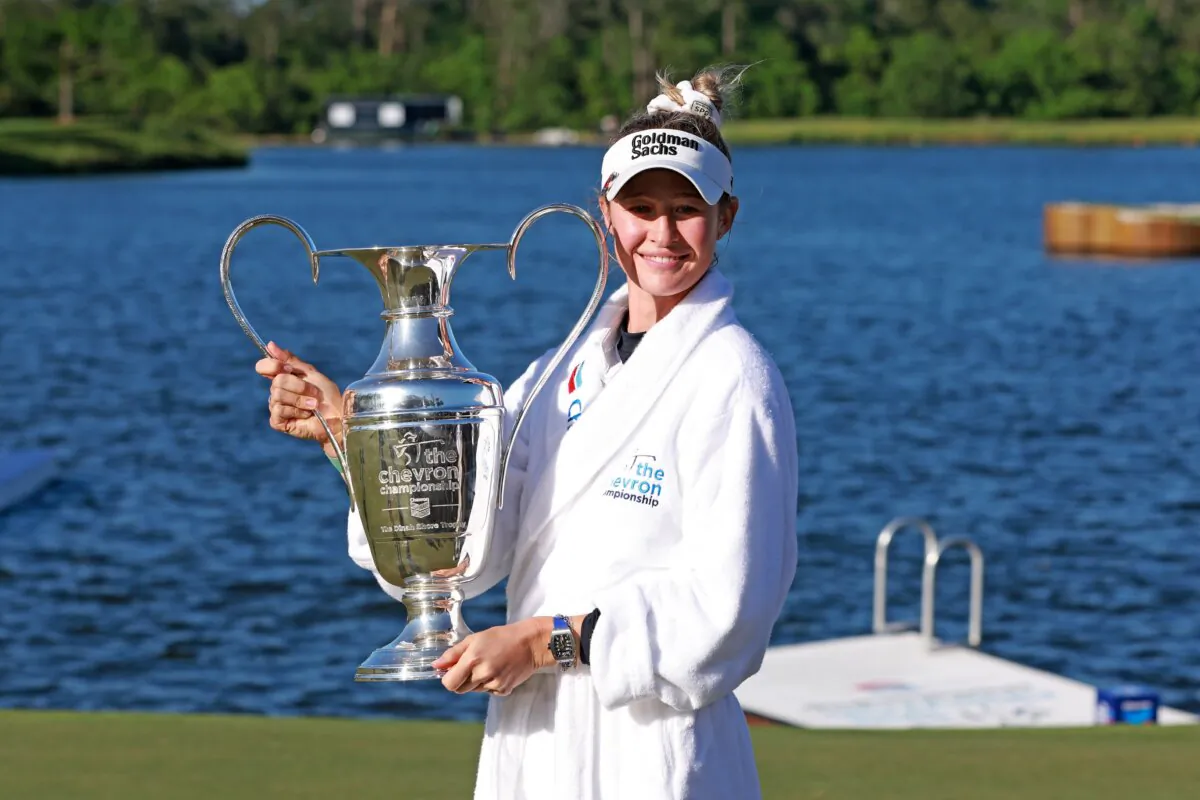 Nelly Korda of the United States celebrates with the trophy after winning The Chevron Championship at The Club at Carlton Woods in The Woodlands, Texas, on April 21, 2024. (Gregory Shamus/Getty Images)