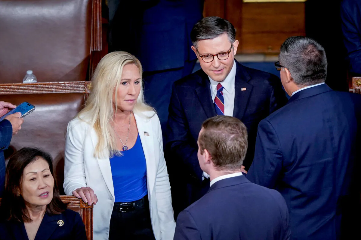 Rep. Marjorie Taylor Greene (L) and House Speaker Mike Johnson (R-La.) (2nd R) arrive for the address by Japanese Prime Minister Fumio Kishida to a joint meeting of Congress at the U.S. Capitol in Washington on April 11, 2024. (Drew Angerer/AFP via Getty Images)