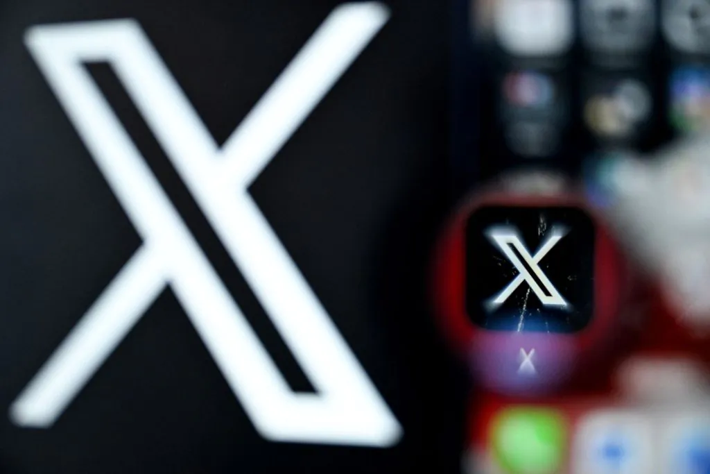 A photo taken on March 11, 2024, shows the logo of U.S. online social media and social networking service X on a smartphone screen in Frankfurt am Main, western Germany. (Kirill Kudryavtsev/AFP via Getty Images)