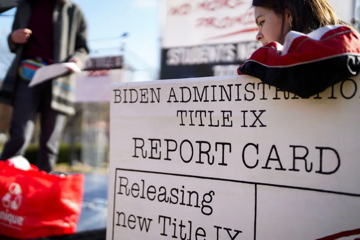 A rally in front of the White House to press the Biden administration to release the long-awaited final Title IX Rule in Washington on Dec. 5, 2023. (Leigh Vogel/Getty Images for National Women's Law Center)