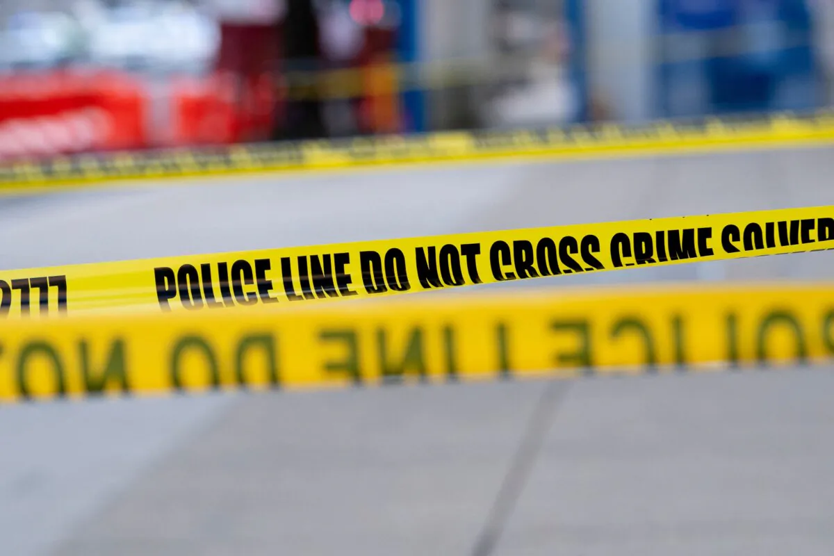 Police tape in a file photo. (Stefani Reynolds/AFP via Getty Images)