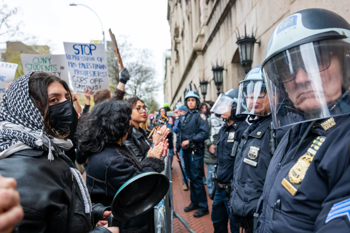Students and pro-Palestinian activists face police as they gather outside of Columbia University to protest the university's stance on Israel in New York City on April 18, 2024. (Spencer Platt/Getty Images)