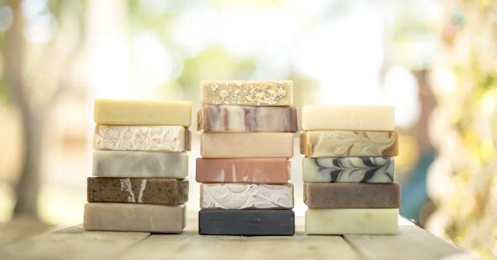 Bumblewood soaps are a combination of palm, coconut, olive and almond oils and shea butter, mixed with various scents and ingredients such as coffee grounds or oatmeal. (Courtesy of Meg and Ben Hollar)